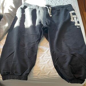 Nike Womens Capri Black Joggers with White Logo